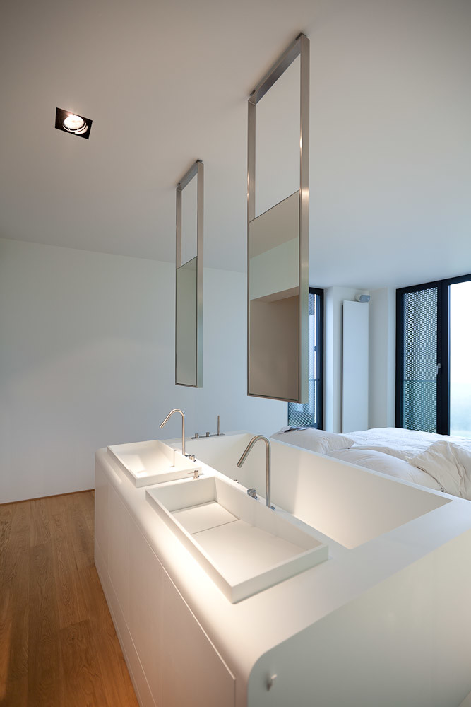 bathroom apartment ceiling mirrors bed bedroom building metaform mirror bathrooms hanging bathtub attached interior architects bad tub sink sinks luxembourg