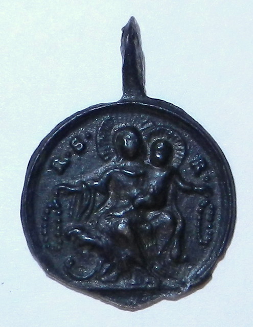 Ancient, Christian medal depicting the rosary