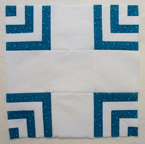 There are two basic blocks you need for a Carpenter's Square quilt top. This block is the simpler one.