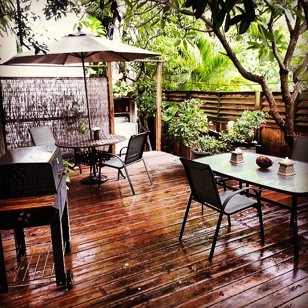 After a break in the rain, the back porch is coming together! #backyard #patio #retreat #bbq #tropical #party