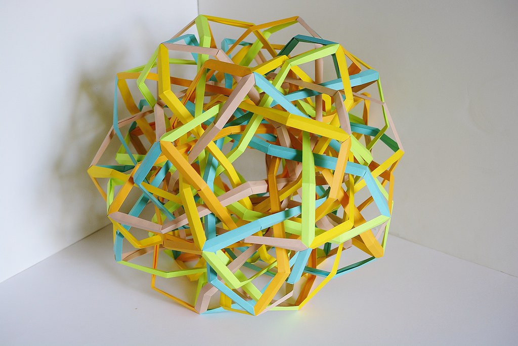 “Ultrasphere” Five Interlocking Wrinkled Tetrahedrically Triaugmented Hexahedrically Twisted Augmented Tetrahedra (Byriah Loper)