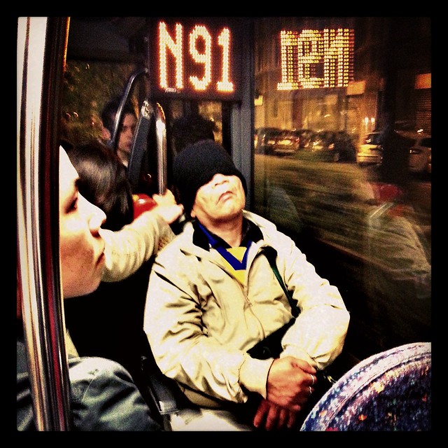 Sleeping on a night bus in Milan, Italy