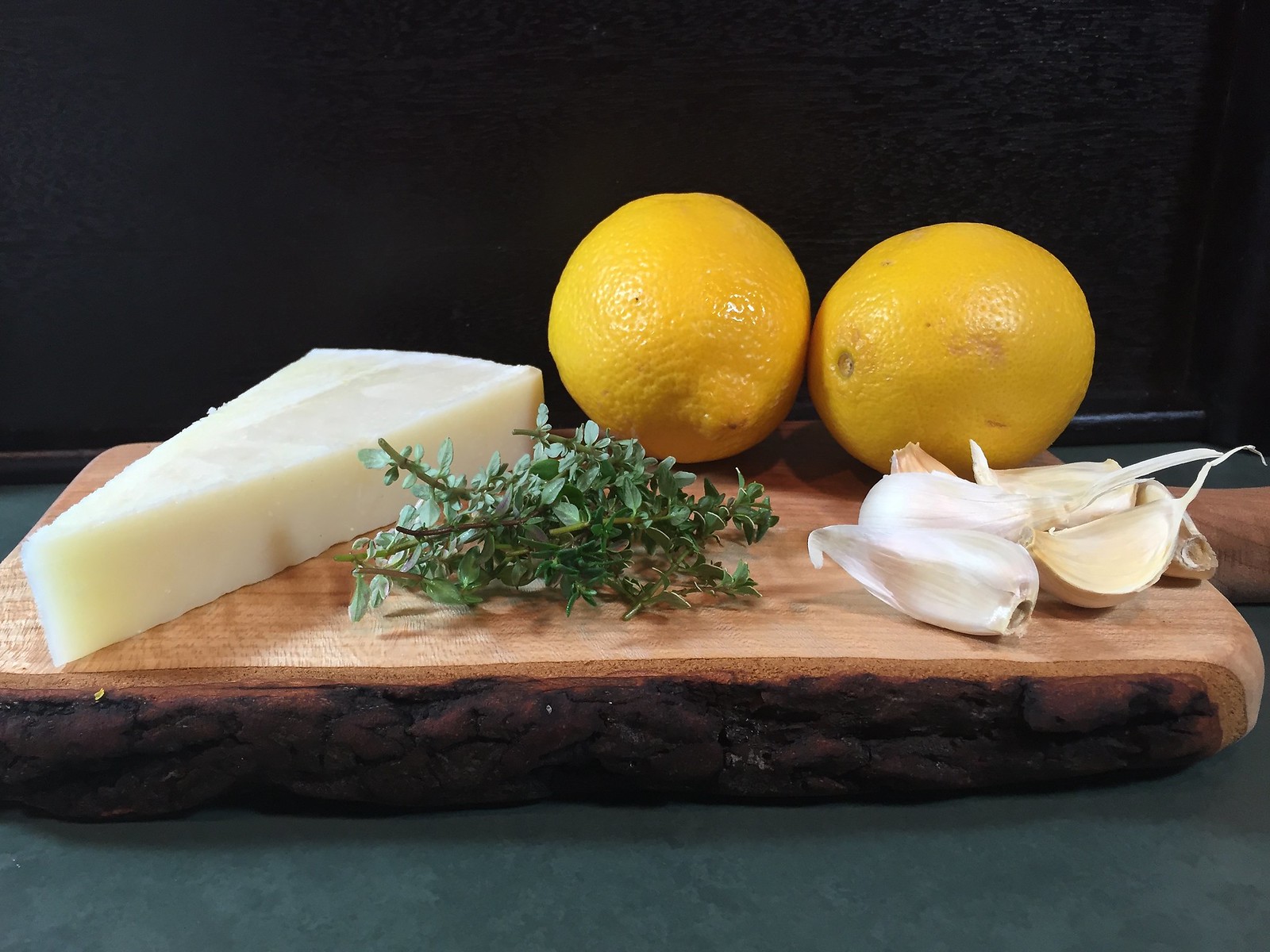 garlic, lemon, thyme, and pecorino romano