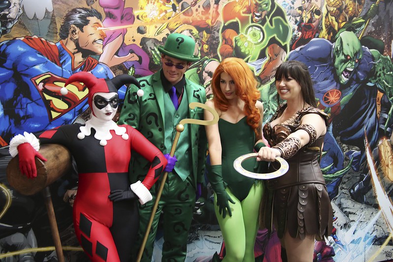 People dressed as Harley Quinn, Riddler, Poison Ivy, and Xena