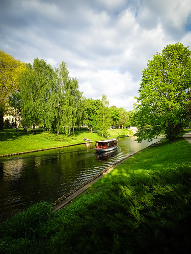 park city trees sky green nature grass clouds river landscape boat spring outdoor sunny latvia riga