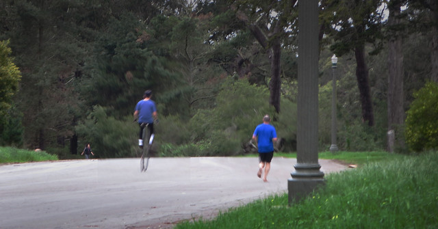 walker, large wheel bicyclist, barefoot runner.  golden gate park, san francisco 03.09.14