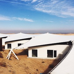 Lotus hotel under construction in the desert #igers #igersbeijing #iphone5s #ordos #desert #lotushotel #landmark #archdaily #architecture #design #desert #instahub #instagood #instavscocam #vsco #vscocam #vscogood #vscogrid #vscoonly #vscomania #vscophile