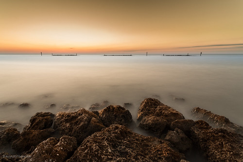 Twilight by khanusiak, Rocks Washed By Ocean Waves During Twilight Hourocean sunset sea orange water twilight rocks waves g