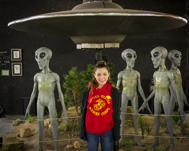 Aliens hanging out with Kennedy