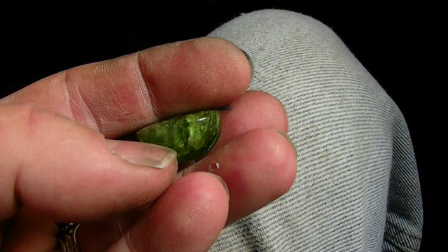 The Peridot stone is 19 mm X 23.5 X 12.3 mm thick and about 53.5 ct
