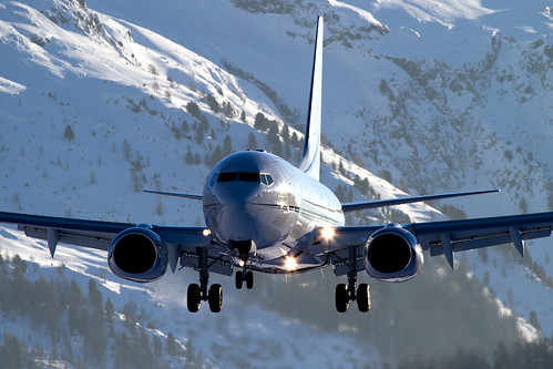 light sunset mountains alps canon switzerland engine landing landinggear government boeing kazakhstan flap flaps smv bbj 737700 shortfinal landinglight 100400mmf4556lisusm canoneos7d bbj1 kazakhstangovernment onjet