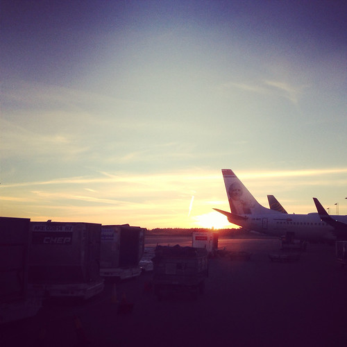 sunset oslo sunrise airplane airport luggage baggage gardermoen