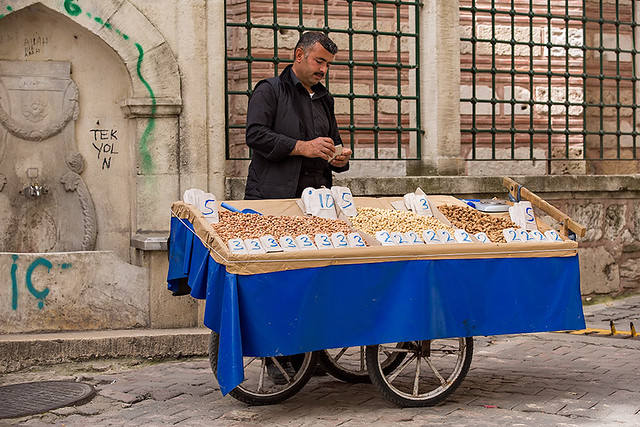 Street vendor selling nuts in the streets of Istanbul, Turkey.