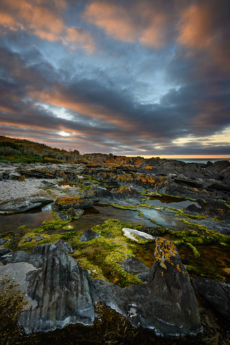 ocean sunset sky orange water clouds twilight rocks australia southaustralia kangarooisland penneshaw gnd06
