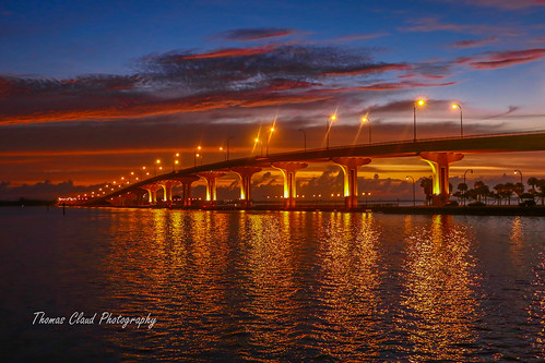 bridge usa seascape water clouds sunrise lights florida cloudy sparkle sparkling causeway indianriver jensenbeach skysun jensenbeachcauseway