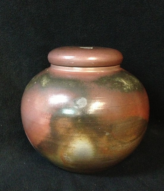 Wood fired ash glaze lidded tea jar.