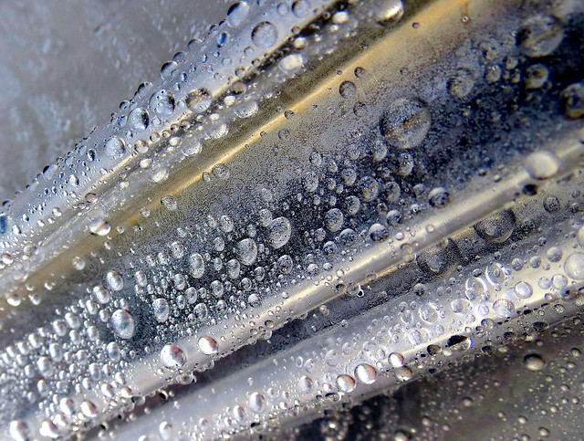 rain-water on pleated plastic