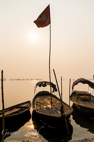 morning sky sun india sunrise river boats dawn boat flag sail boatman ganga ganges oars mela sangam allahabad prayag uttarpradesh yamuna kumbh triveni