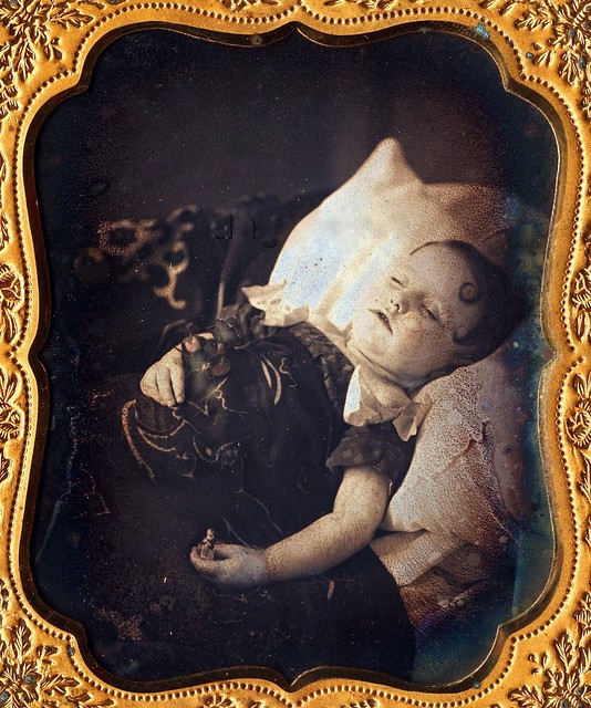 Deceased Boy Holding Toy and Flower, 1/6th-Plate Daguerreotype, Circa 1855
