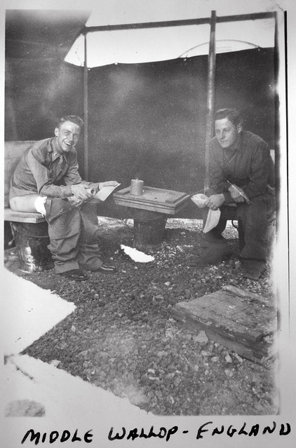 1940s World War II snapshot photo of American officer Andy Magin (left) 9th United States Army Air Forces USAAF, 6th Tactical Air Command and an unidentified soldier sitting on portable pots for their morning constitution. The photo was taken at Middle Wa