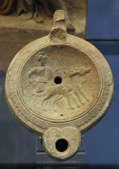 Terracotta oil lamp depicting Mars in a chariot pulled by two dogs, 2nd century AD, Staatliche Antikensammlungen, Munich