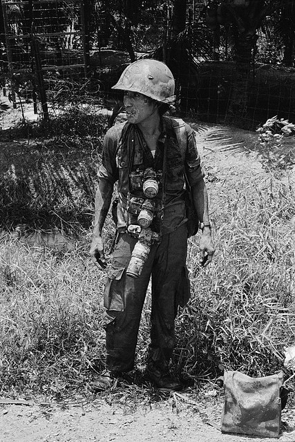 Cai Lay, South Vietnam 1972 - UPI staff photographer Willie Vicoy is covered with mud
