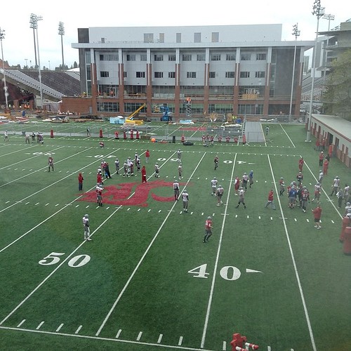 Checking out a rainy Football practice from inside dry Terrell Library #WSU #GoCougs