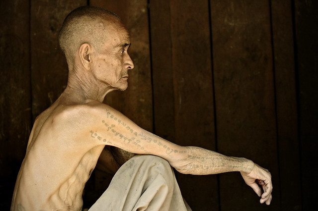 Skinny tattooed man of the Loi tribe - Shan State - Myanmar