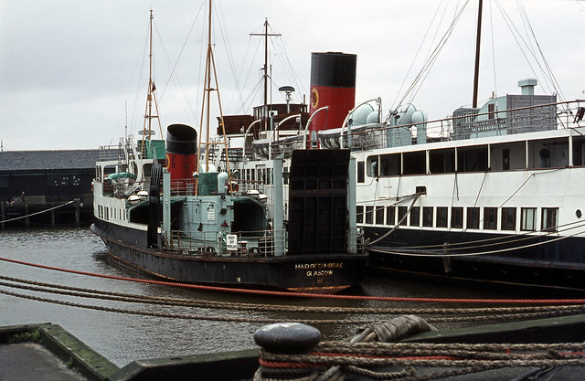 'Maid of Cumbrae' alongside 'Queen Mary II' in Greenock Dock. Feb'75.