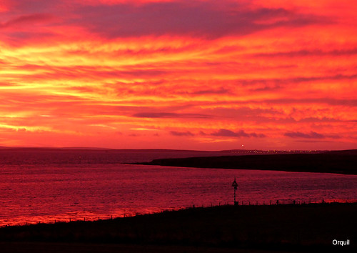 uk greatbritain morning pink winter light panorama seascape reflection silhouette sunrise island dawn lights islands bay scotland seaside nice orkney december natural shoreline anchorage colourful cloudscape cloudscapes memorable houton sheltered leadinglight scapaflow oilterminal flotta southronaldsay gasflare southisles holmofhouton