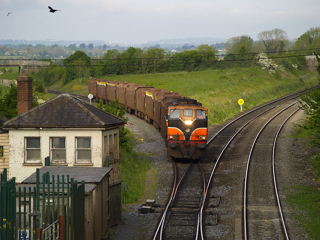 083 on Waterford-Sligo ety timber train at Cherryville Jcn. 11-May-07
