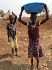 South Sudan young girls carrying water