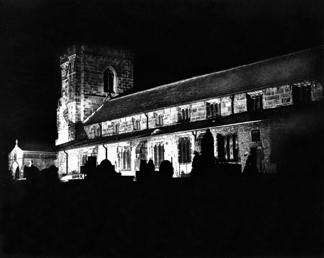 Kildwick St Andrew's Village Church in Yorkshire on a winters night in the early 1960s