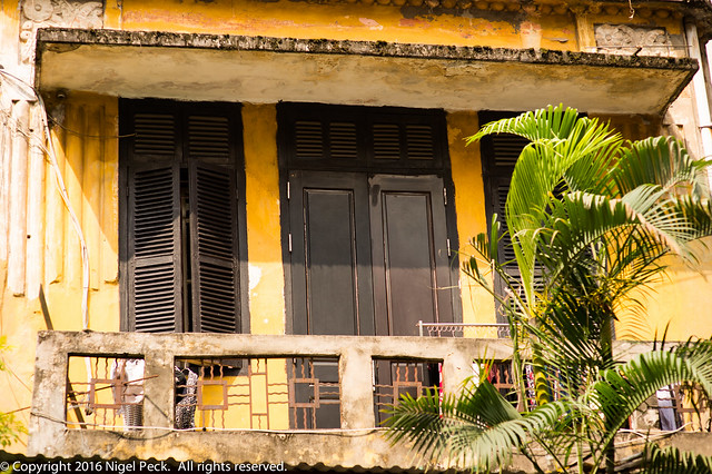 Hanoi Traditional Yellow Walled House with Balcony