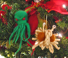 cthulhu and flying spaghetti monster ornaments on tree