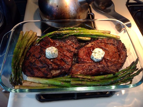 Steak, herb butter and asparagus