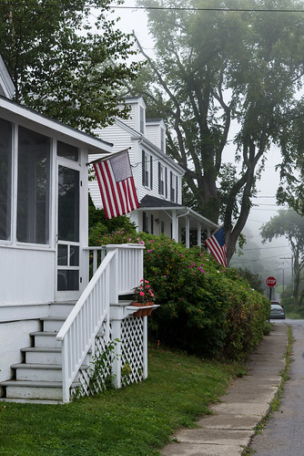 houses homes fog landscape flag maine foggy streetphotography americanflag porch starsandstripes smalltown castine