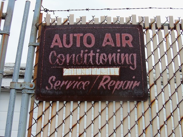 Rusted Auto Air Conditioning Sign