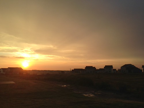 Sunrise after the rain by allysther, I'm hoping for one more day of cooler temperatures before it shoots back into the high 90s.