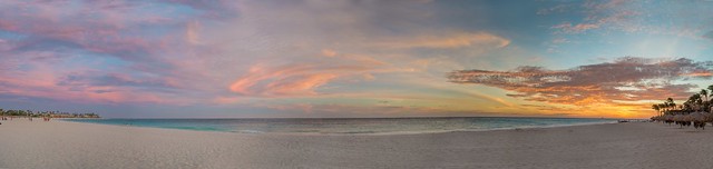 A panorama of a beautiful sunset in Aruba taken from the Divi All Inclusive Resort
