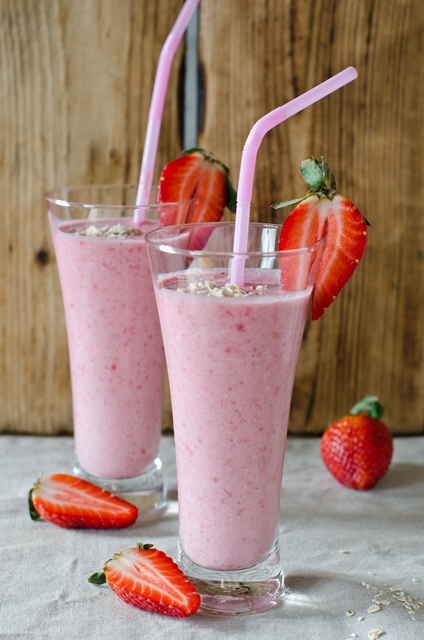 Strawberry smoothie on a wooden table