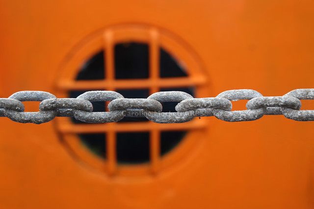 Orange Porthole And Chain