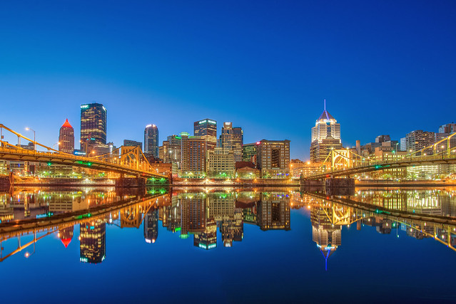 Pristine reflections of the Pittsburgh skyline in the morning blue hour HDR