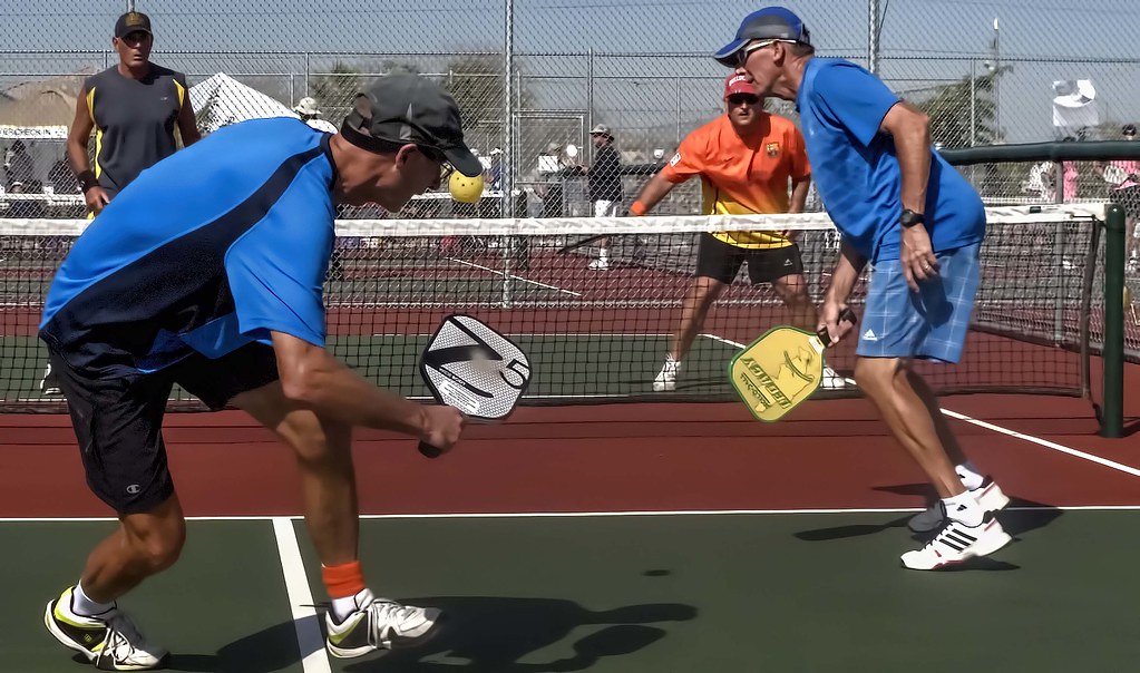 Grand Canyon 2014 Pickleball Tournament - two men playing tennis on a tennis court