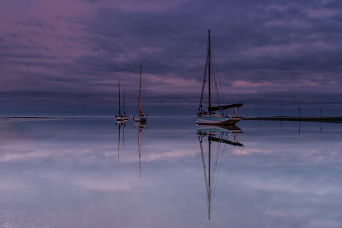 mersea merseaisland essex oystersmack smack calm reflections water sea tide purple lilac colours boats moored coast coastal coastline thunderstorm cloudscape seascape