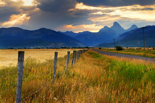 road morning travel sky mountains field clouds rural sunrise canon fence landscape sigma idaho 7d rays grandtetons peaks tetons sunrays hdr countryroad driggs mountainrange photomatix 1750mm