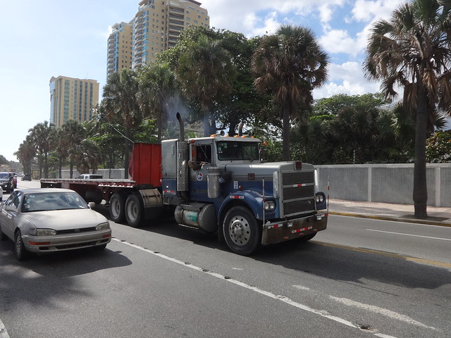 Wow!, A Marmon conventional with a flatbed trailer