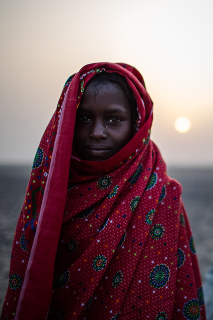 Afar girl wrapped in a cloak in Danakil depression