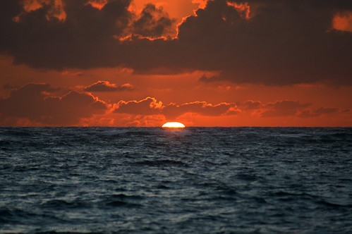 ocean sky sun water clouds sunrise rising dominicanrepublic surface emerging atlanticocean puntacana thegalaxy infinitexposure