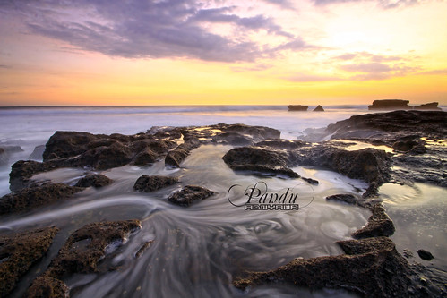 sunset bali motion beach water rock indonesia landscape flow photography tour lot wave guide tanah gently melasti baliphotography balitravelphotography baliphotographytour baliphotographyguide